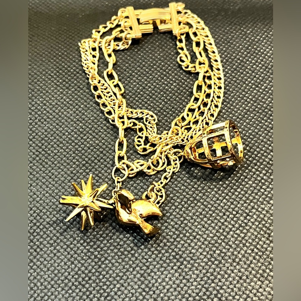 Gold toned multi chain chair bracelet